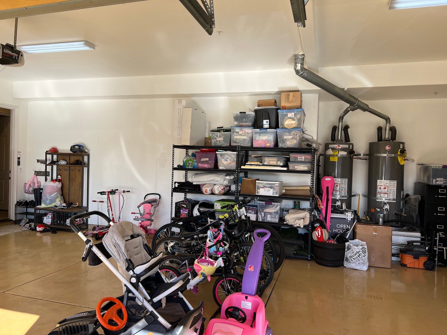 Before spring cleaning picture of a cluttered garage space