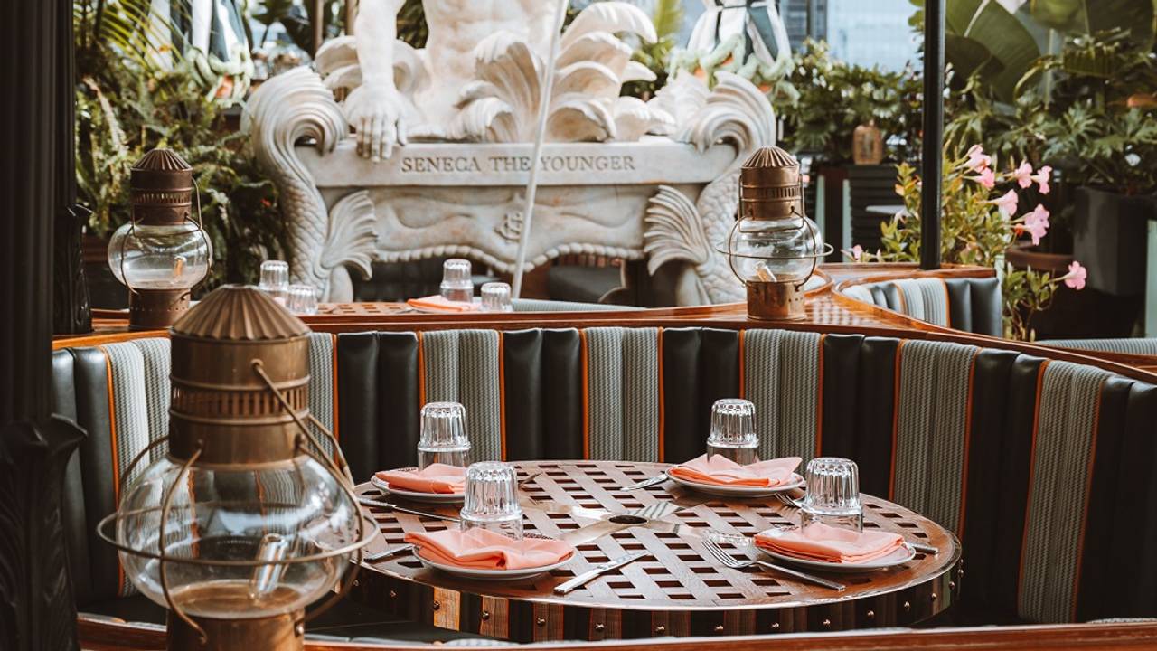 A booth at San Diego restaurant and rooftop bar Seneca Trattoria located in downtown