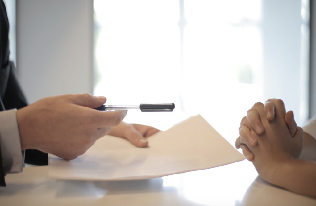 An MBA consultant talking with a client