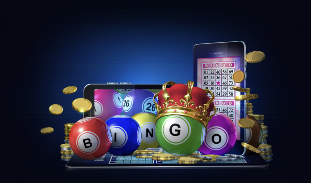 Bingo balls wearing a crown infront of a computer and smartphone