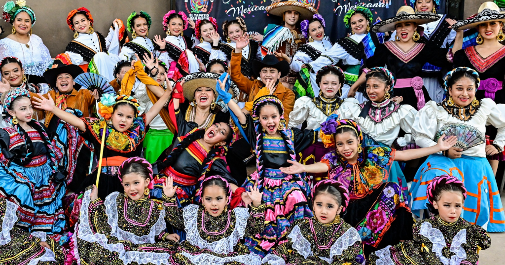 Women dressed in Mexican dresses to celebrate Día de Muertos in Encinitas, San Diego