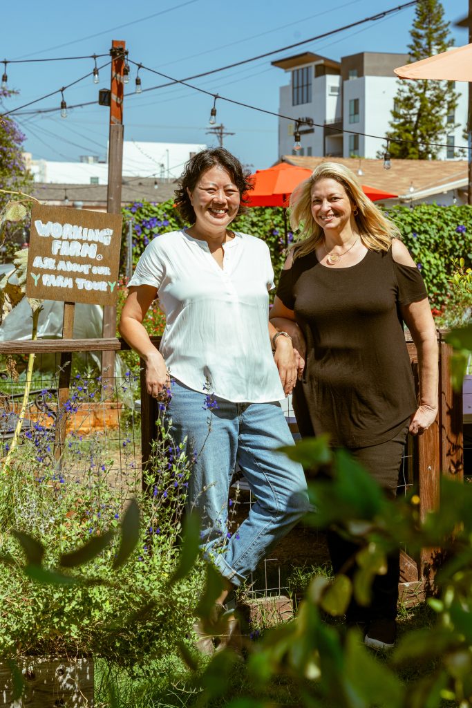 MAKE Projects leaders executive director Anchi Mei and deputy director Samantha Forusz in the community garden