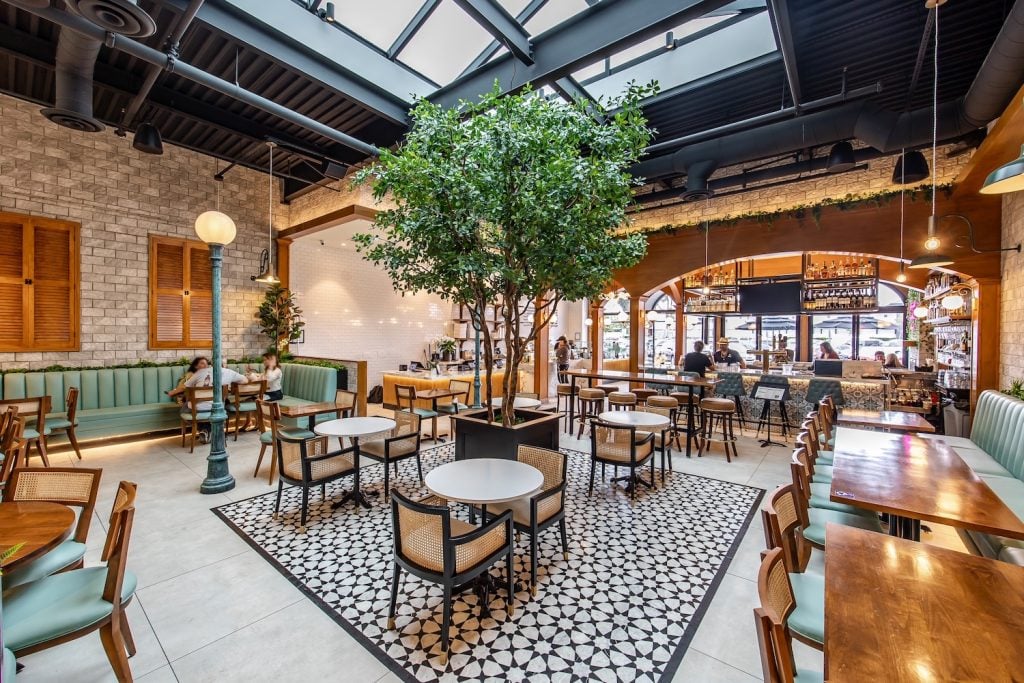 Havana Grill cuban restaurant's spacious interior with skylight and tree located in Clairemont San Diego