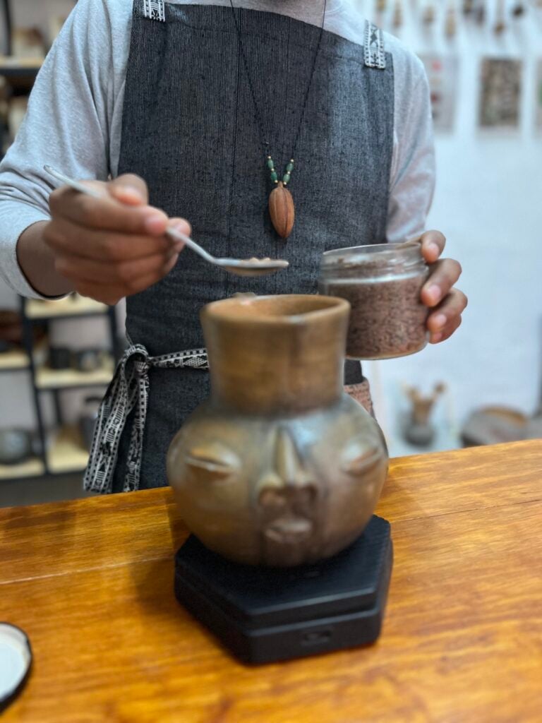 Local Diego Armando Contreras measures the perfect ratio of chocolate to water for the quintessential Oaxacan hot chocolate 