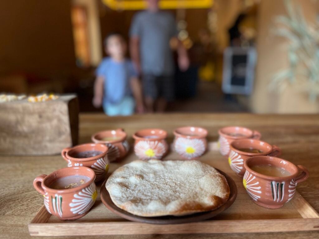 A flight of eight different corn-based drinks at La Atolería in Oaxaca Mexico