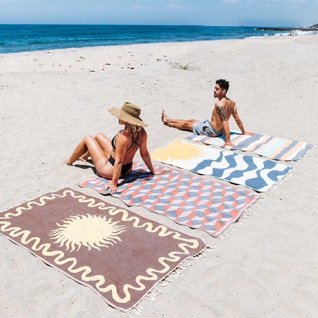 San Diego magazine holiday gift guide item Surfrider Sunburst towel from Sand Cloud