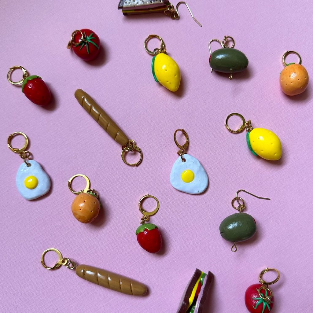 Editor's pick, Resinuendo, a Sam Diego company producing food shaped jewelry like eggs, strawberries, and lemons