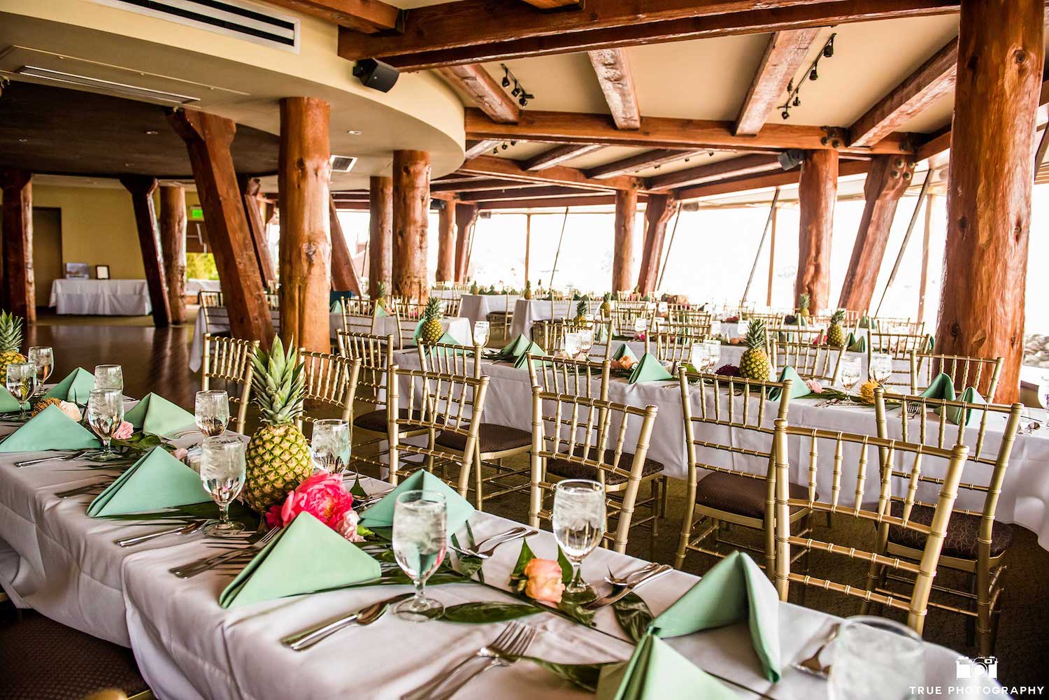 Interior of San Diego restaurant Bali Hai with several tables prepared for an event or reception