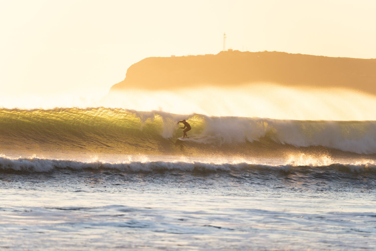 San Diego surfer at sunset in Coronado