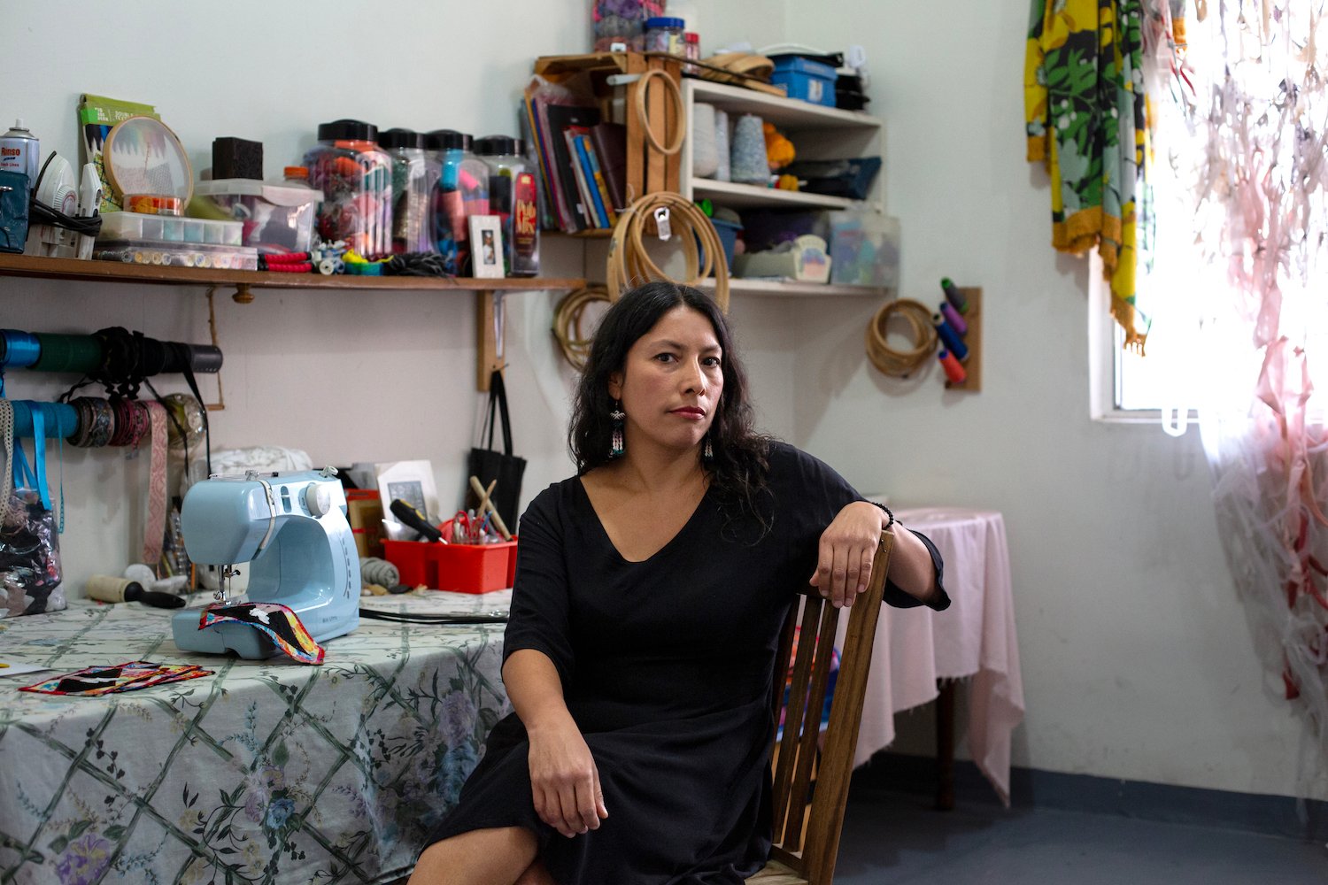 Mexican artist Marisa Raygoza working in her Tijuana art studio