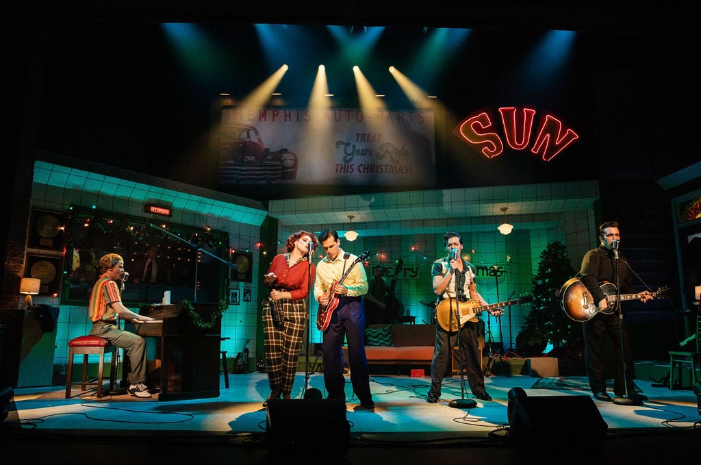 Band on stage in 1960s attire performing the Million Dollar Quartet Christmas at Balboa Theatre