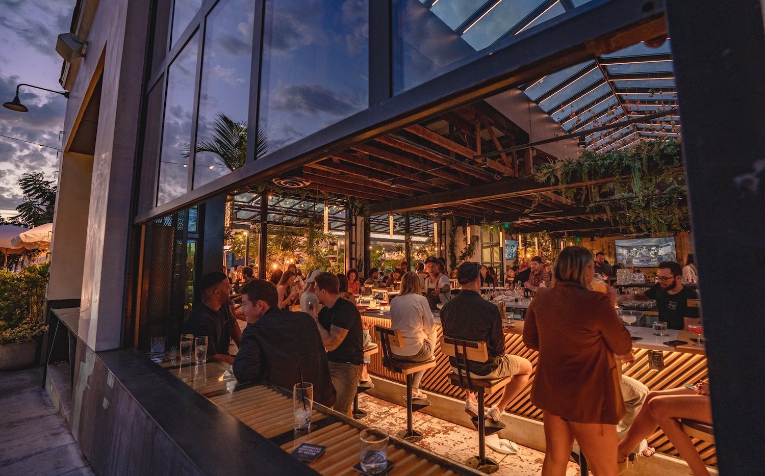 Interior of San Diego restaurant Nolita Hall in Little Italy featuring a private event spaces and spacious bar