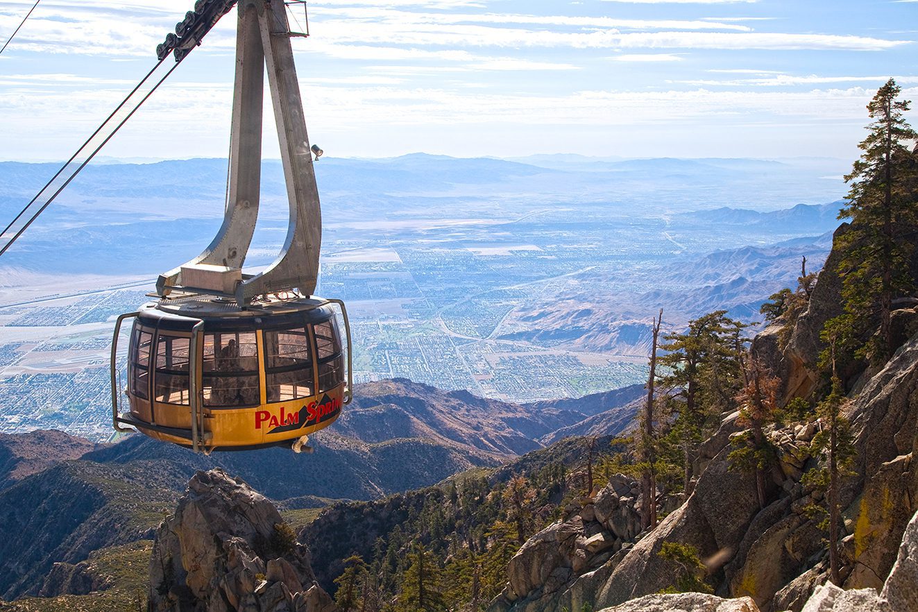 Best hikes in California featuring 
Palm Srings Tramway and Cactus to Clouds Trail) with a view down San Jacinto peak