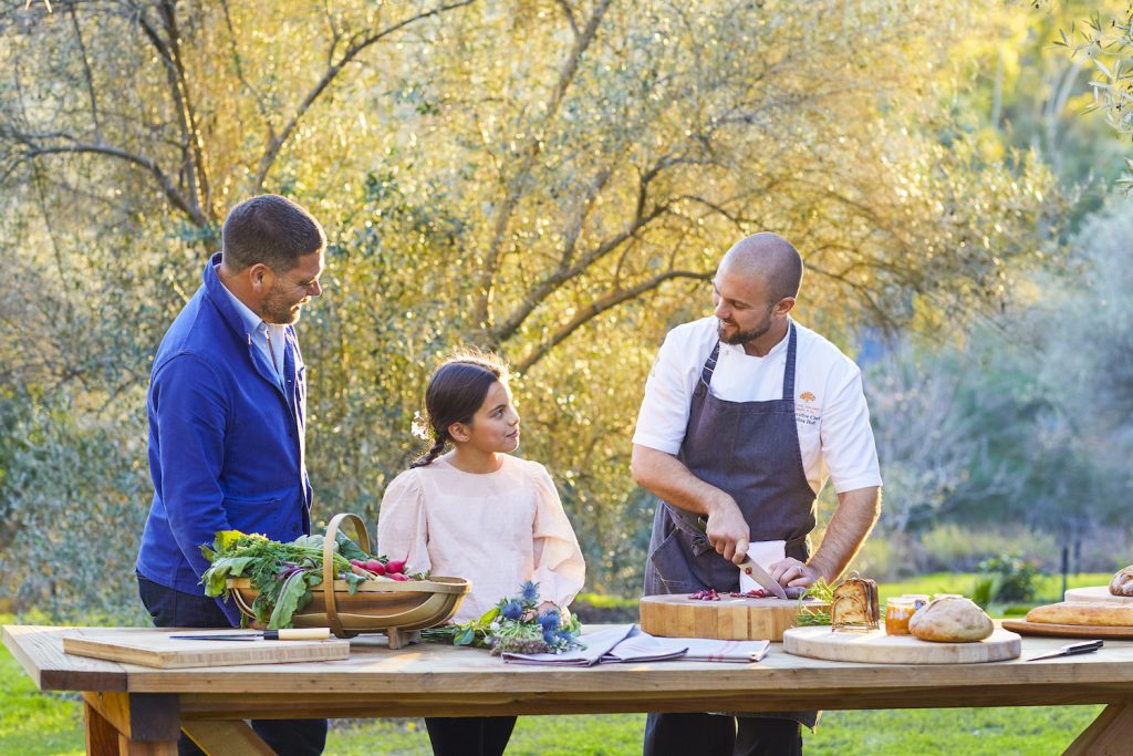 Chef showing how to prepare a dinner with locally grown ingredients