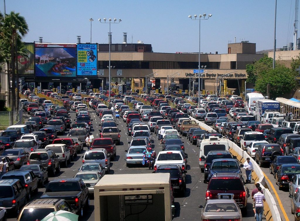 Line of cars waiting to cross the US Mexico border in San Ysidro near San Diego