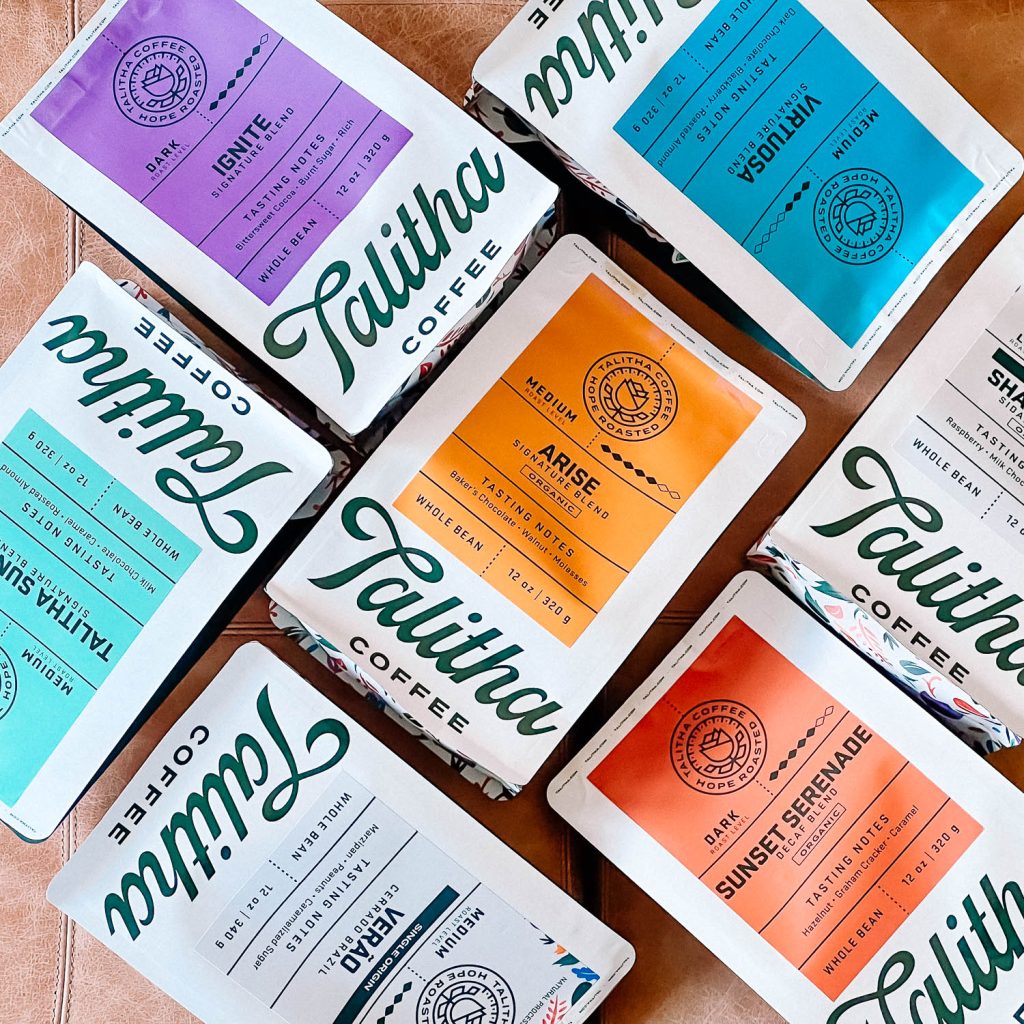 Talitha Coffee's roasted coffee beans in colorful bags
