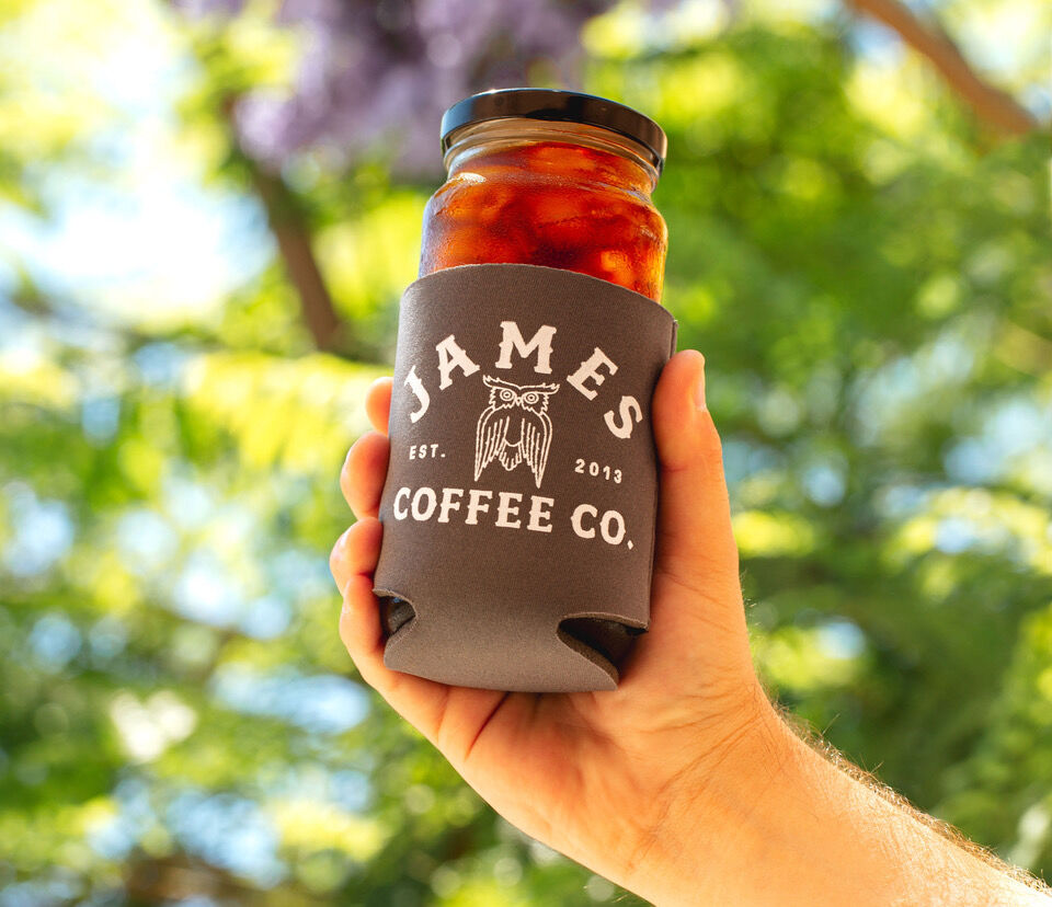 San Diego Magazine's Happy Half Hour Podcast thumbnail image featuring a jar of coffee from James Coffee filled with coldbrew