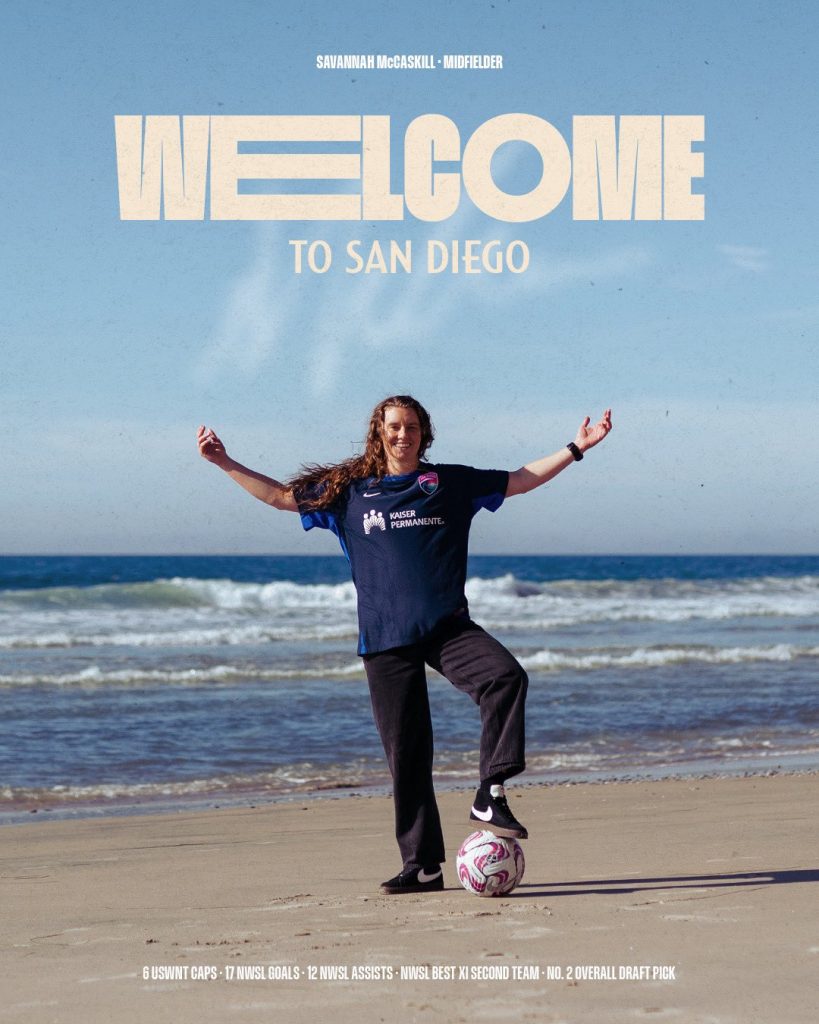 Savannah McCaskill standing at the beach with a soccer ball in a San Diego Wave FC jersey