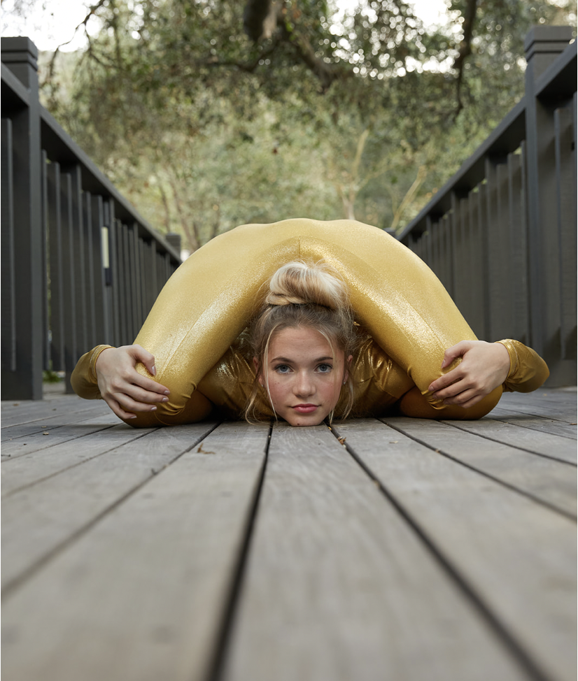 San Diego-based viral contortionist Emerald Gordon Wulf folded into a position with her knees over her shoulders