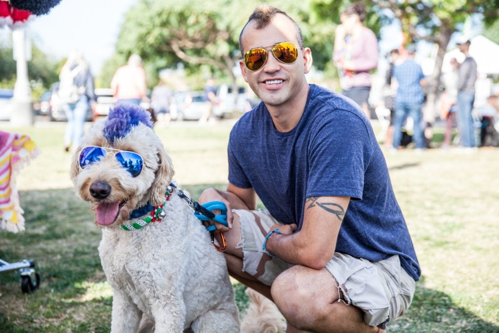 Things to do in San Diego this weekend January 18-21 including the Doggie Street festival in Point Loma featuring a guy and his dog with matching haircuts and sunglassess