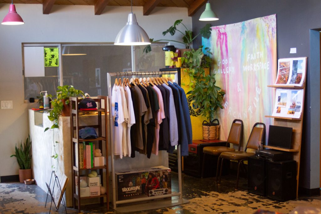 Interior of Good Faith Gallery in Sherman Heights, San Diego featuring clothing, merchandise, and artwork from local artists