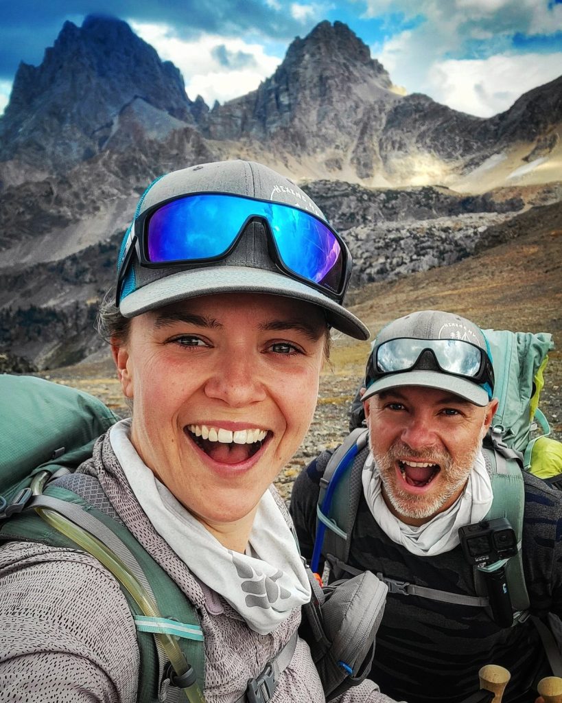A selfie from San Diego author Sydney Williams alongside a member of her hiking organization focused on healing in the mountains 