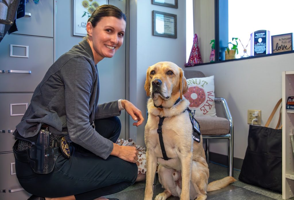 Famous San Diego dog Lyle, a yellow lab that serves the San Diego Police Department's Child Abuse Unit with parter Natalie Hone