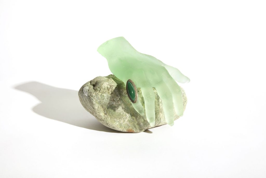 Los Angeles artist Kelly Akashi's sculpture featuring a crystal cast of her hand and a stone from Poston, Arizona