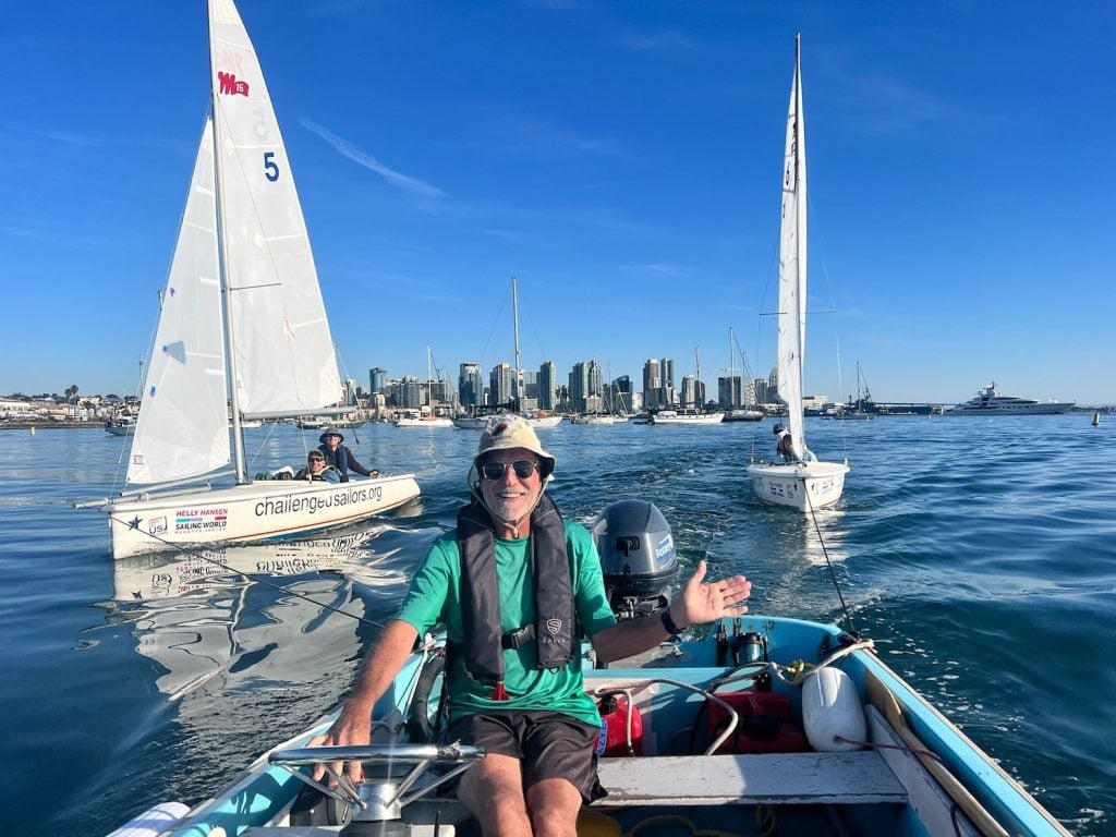 A group of disabled men sailing boats in the San Diego Bay with the organization Challenged Sailors San Diego 
