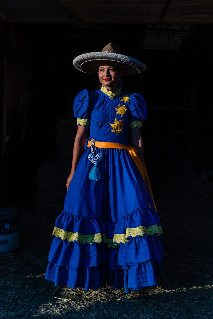 Dania Hernandez from the San Diego Escaramuza team Las Reynas del Sol’s in a traditional Mexican dress