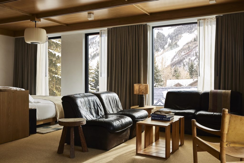 Interior of boutique, luxury hotel Mollie Aspen in Colorado, a popular destination in 2024, featuring leather chairs and Japanese design influences 
