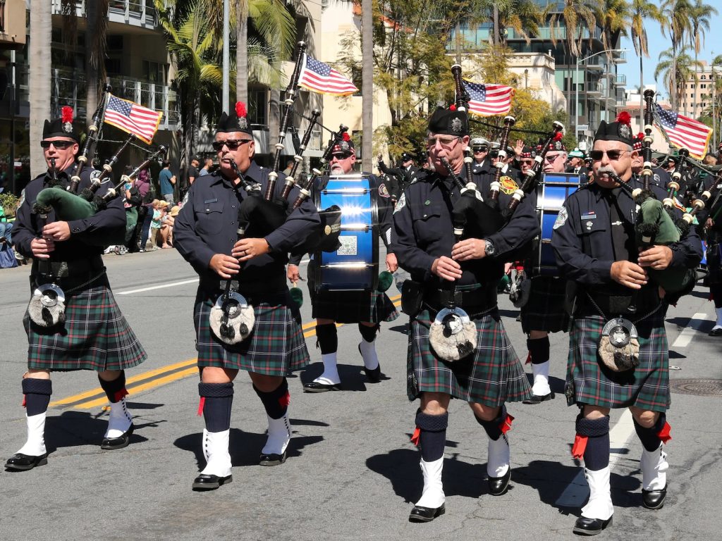 Group of men playing the bagpipes during Irish bagpipes during the 42nd Annual St. Patrick’s Day Parade and Festival in San Diego