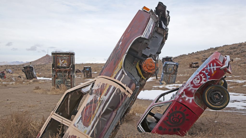 Car Forest of the Last Church featuring graffiti cars  at the Open Air Gallery in Goldfield, Nevada