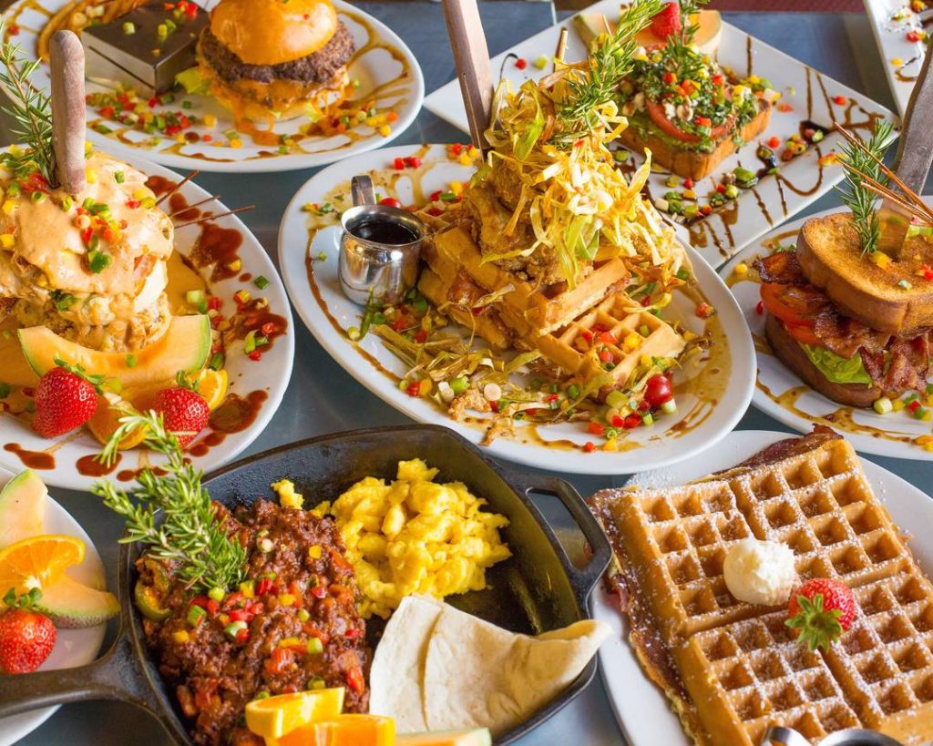 2024 Easter Brunch featuring various breakfast dishes including waffles, eggs, toast, and more at San Diego restaurant Hash House A Go Go in Hillcrest 