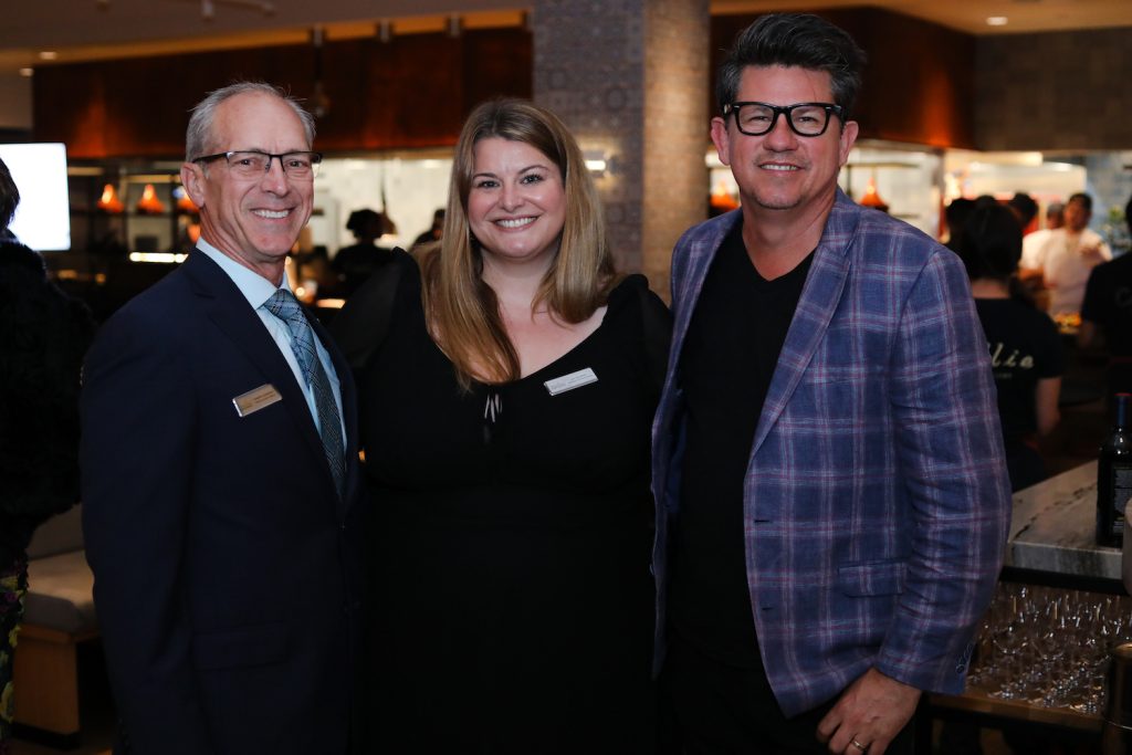 L-R: Feeding San Diego CEO Bob Kamensky, Feeding San Diego's director of development Ali Colbran, and host Troy Johnson, owner and chief content officer of San Diego Magazine at the 2024 Parings for a Purpose