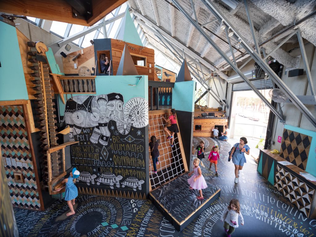 Children playing at the New Children's Museum in downtown San Diego featuring a kids summer camp