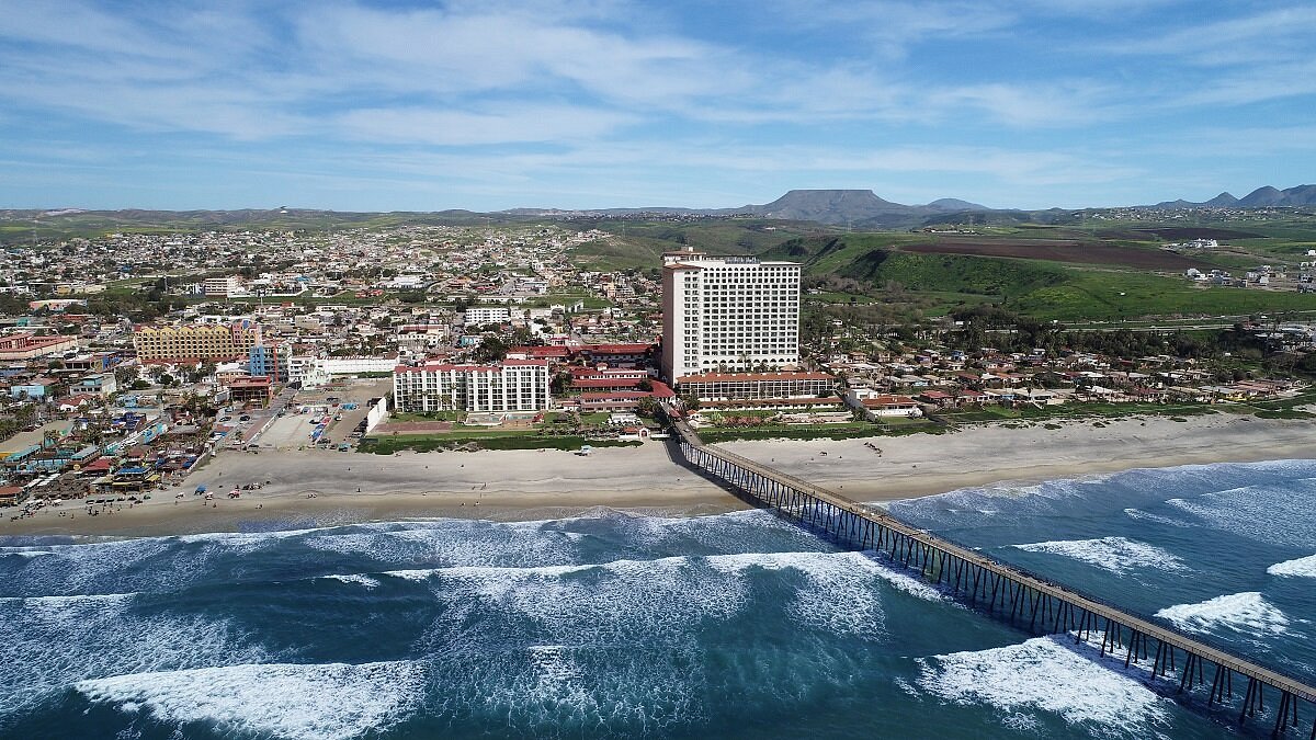 Aerial view of Rosarito beach Baja surf spot and pier 