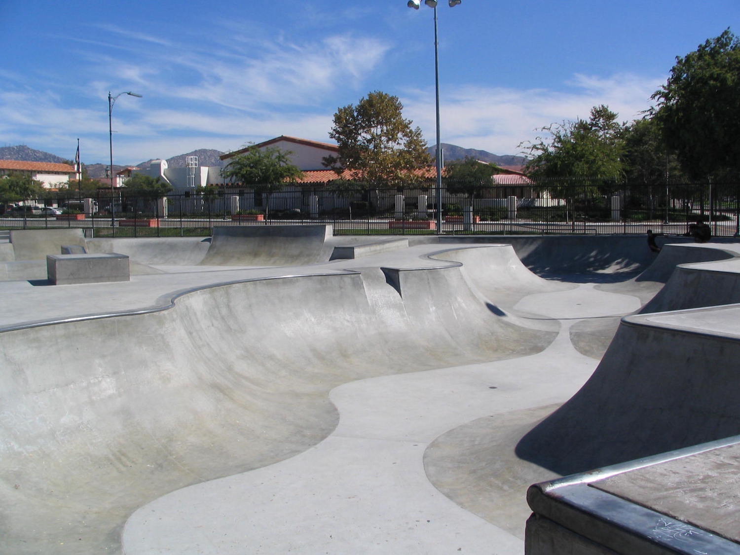 Poway Skate Park in San Diego featuring an empty bowl and half-pipe