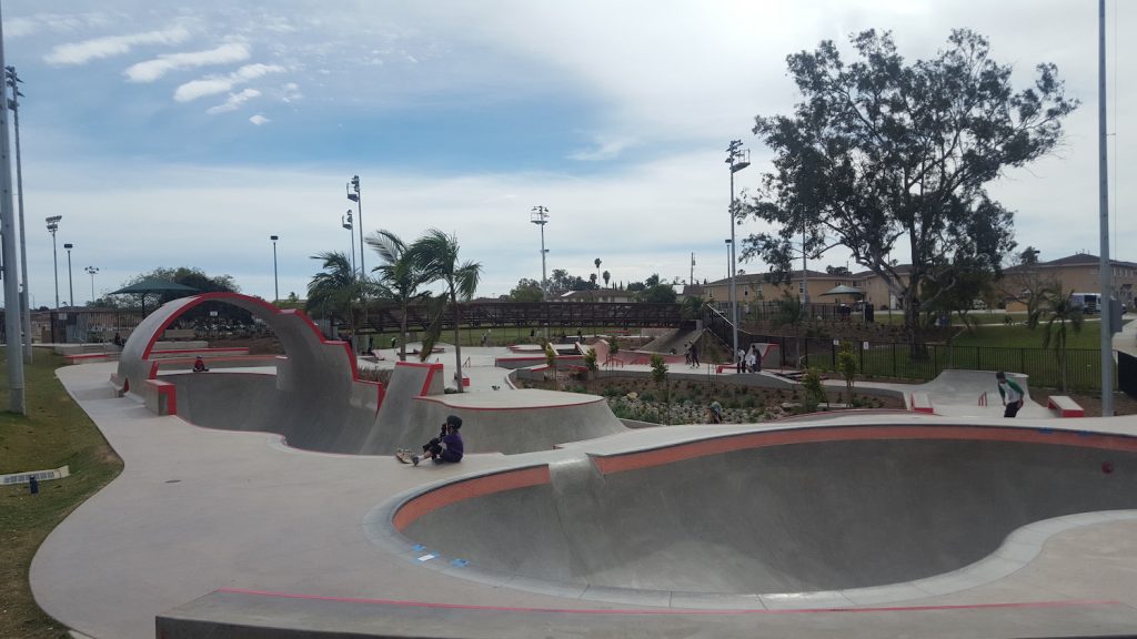 Linda Vista Skateboard Park in San Diego featuring a bowl, ramps, and pedestrian bridge