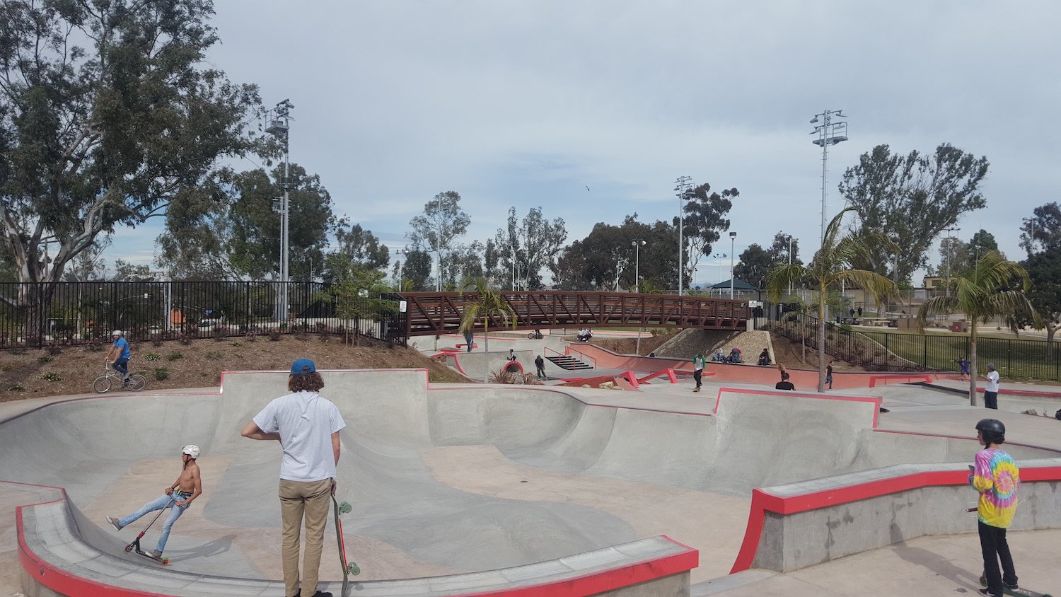Linda Vista skatepark in San Diego featuring skaters on the side of a half-pipe