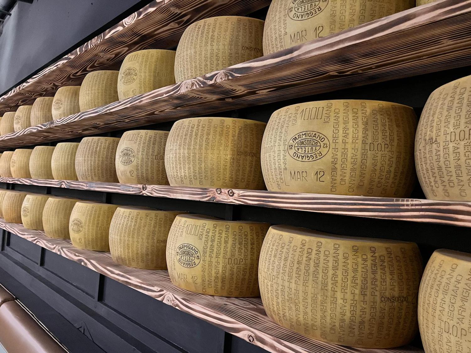 Wheels of cheese from Vincenzo Cucina & Lounge opening in Little Italy, San Diego this week