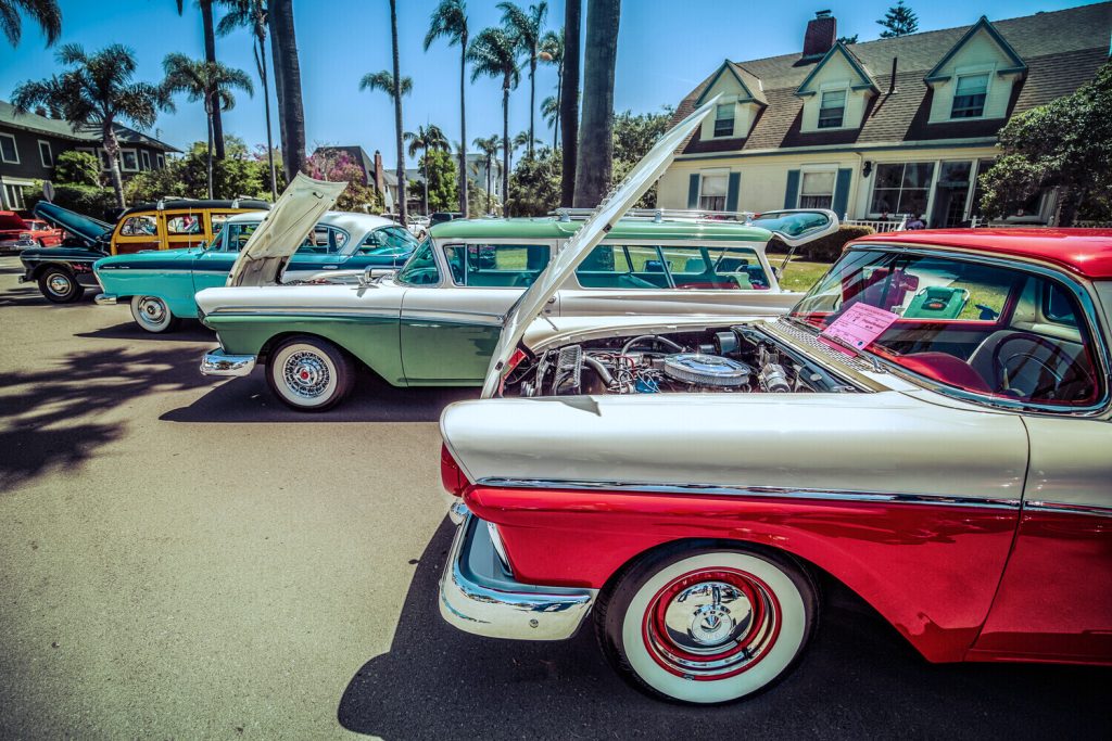 Retro, vintage cars parked outside in Coronado during the MotorCars on MainStreet festival this weekend in San Diego