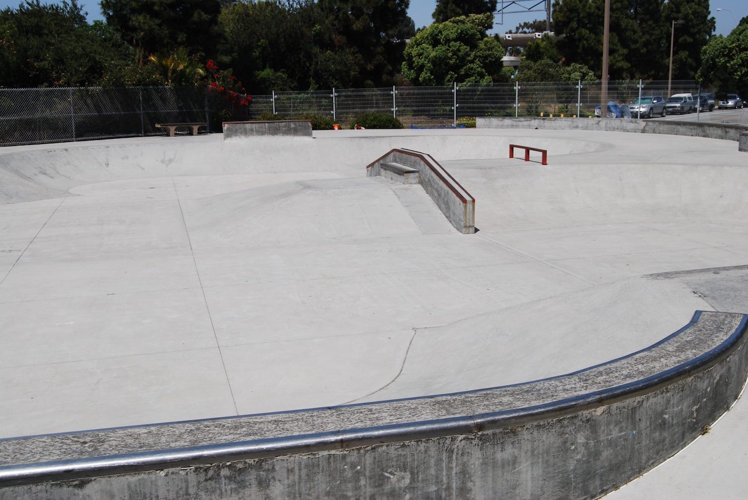 Coronado Skate Park in San Diego featuring a hubba, rail, and quarter pipe to skate in 