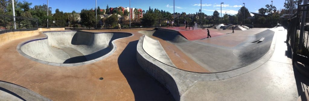 Carmel Valley Skate Park in San Diego featuring two bowls and a couple rails 
