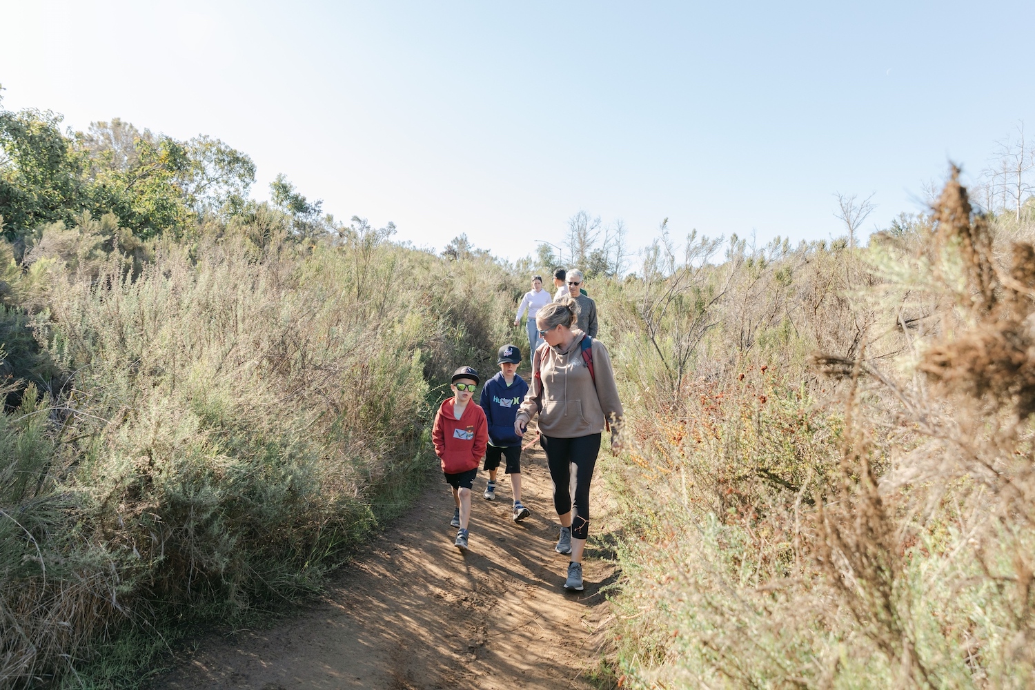 San Diego's Mission Trails Regional Park featuring a family on a hiking trail near Mission Gorge