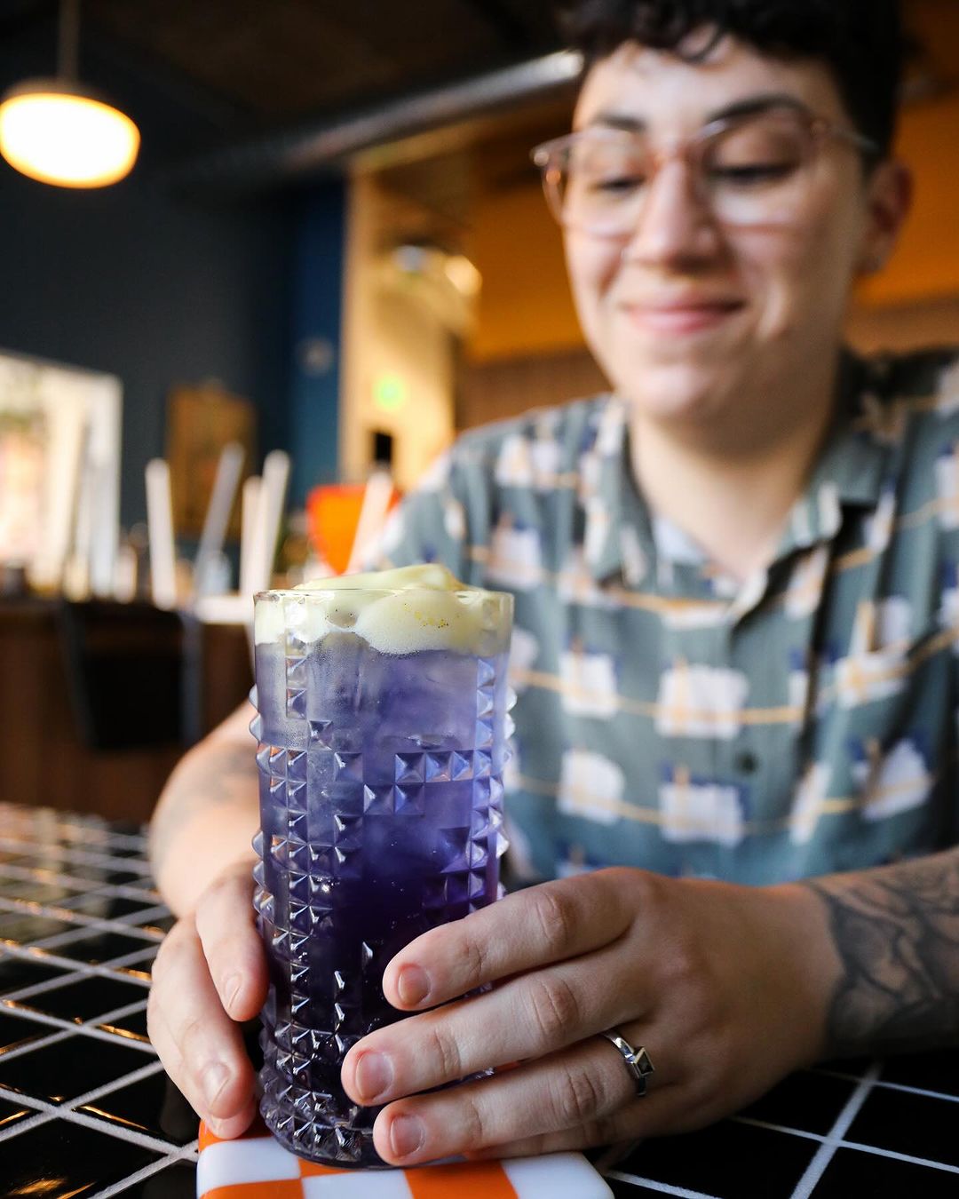 A non-alcoholic mocktail served by a bartender at Mnemonic Coffee in Bankers Hill, San Diego
