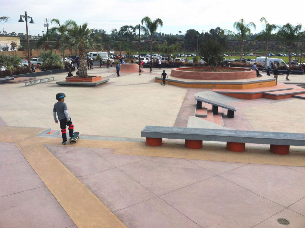 Poods Encinitas Skate Plaza in North County San Diego featuring a young skater about to drop in