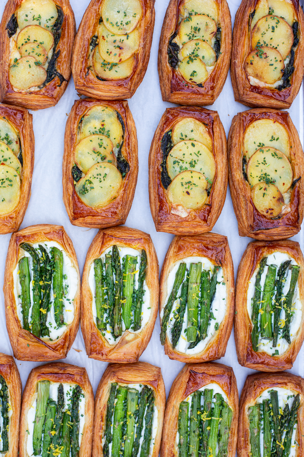 Pastries with potatoes and asparagus on top from San Diego bakery Wayfarer Bread in La Jolla