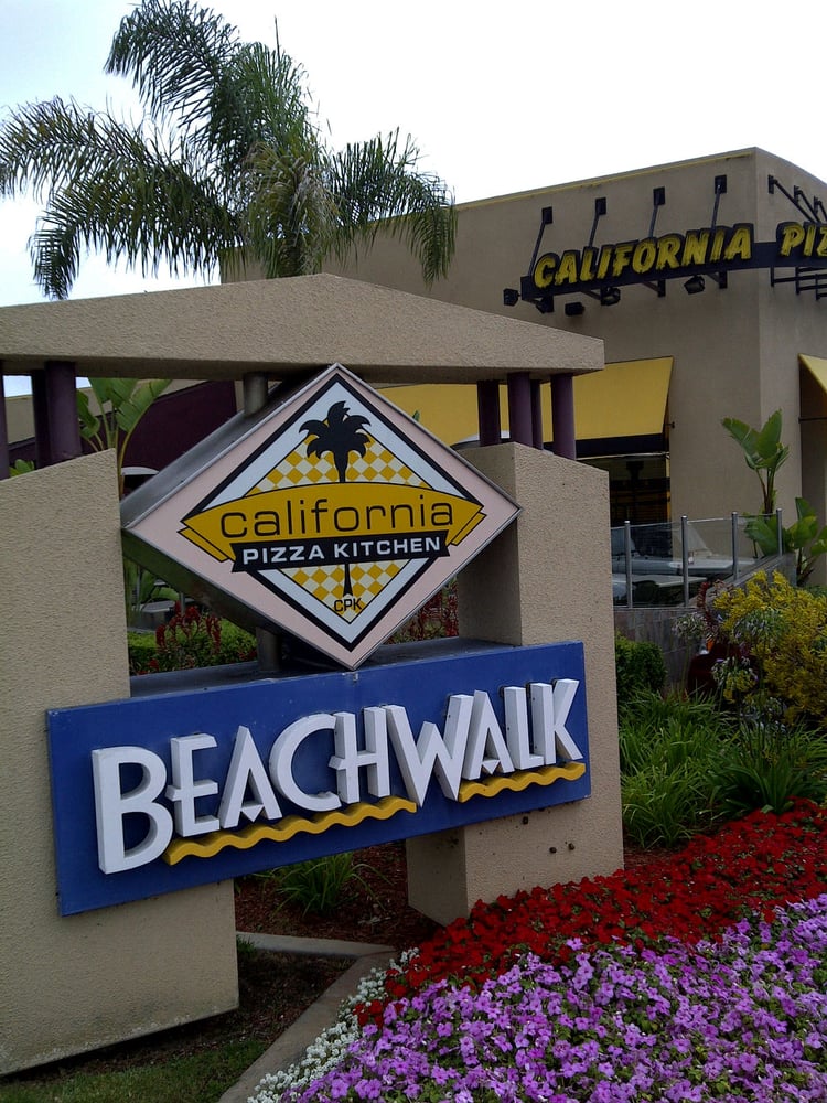 Sign in front of California Pizza Kitchen in Solana Beach, San Diego which is being replaced by a new restaurant Lana in 2025 