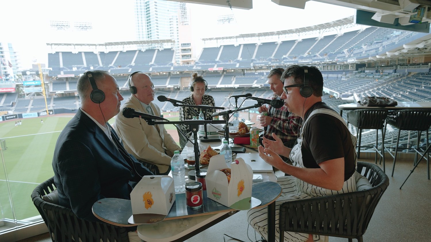 Episode of Happy Half Hour podcast by San Diego Magazine featuring Troy Johnson and David Martin trying Petco Park food with legendary Padres announcers Mark "Mud" Grant and Don Orsillo